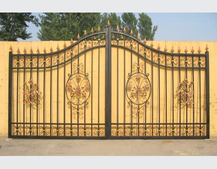 the iron gate,black iron gate,outdoor gate,gate,wrought iron fence