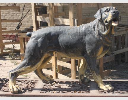 large iron aniaml sculpture dog